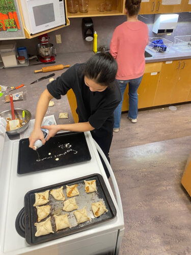 LSS cook for Food Bank